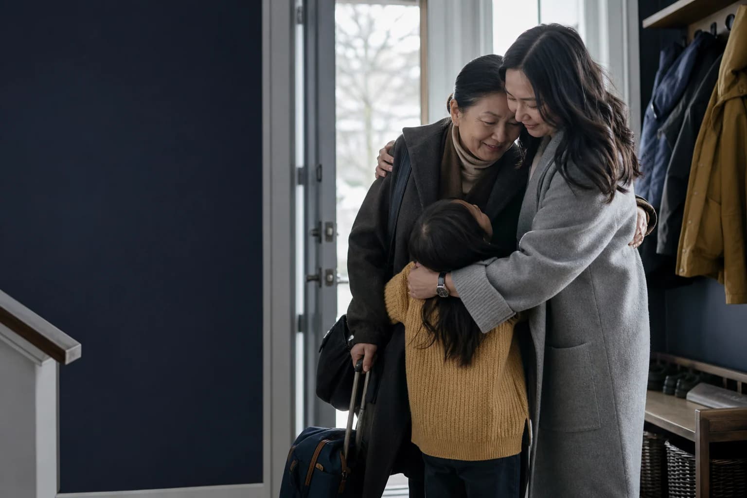 Three generations reuniting in a Canadian family home